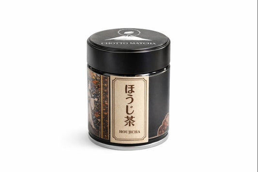 Black canister of Houjicha tea with Japanese text on a white background