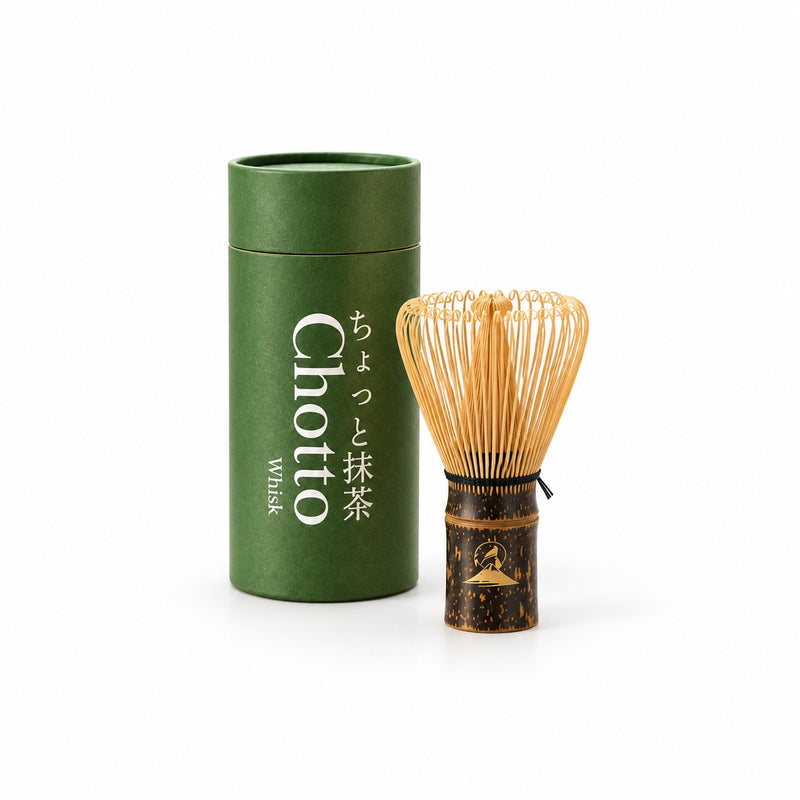 Chotto Matcha bamboo whisk with green cylindrical box on a white background